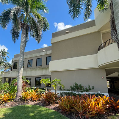 Eco-Friendly-Pressure-Washing-Office-Building Before and after of a pressure washed medical building