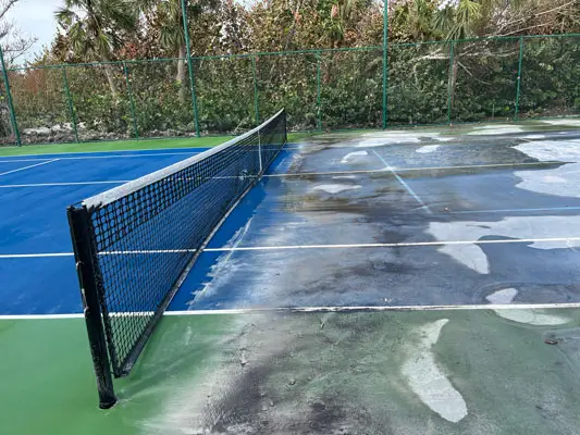 Eco-Friendly-Tennis-Court-Cleaning Tennis court before and after pressure washing